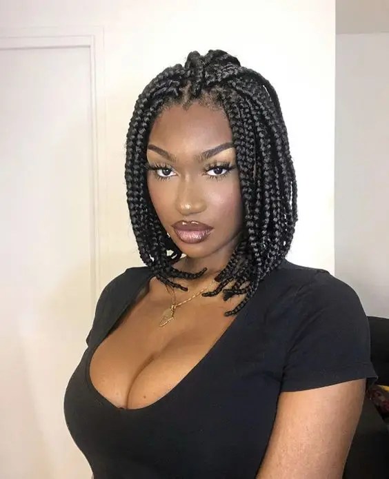 pretty woman wearing short braids