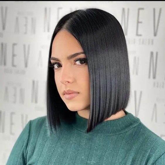 Serious woman wearing short blunt cut hair