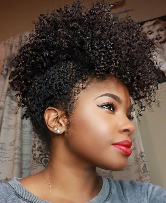 Woman's swaying short curly natural hair