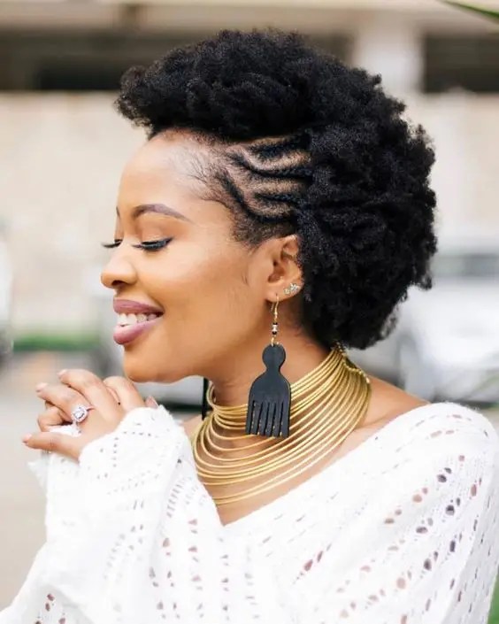 smiling woman rocking short afro hairstyle