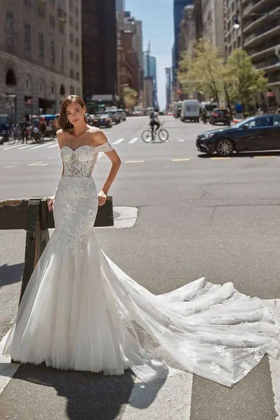 Woman wearing corset wedding dress in the street