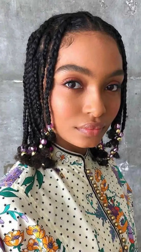 Woman wearing short beaded hair