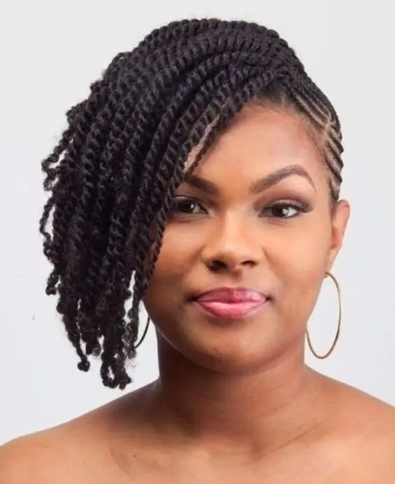 Pretty woman wearing short braids in her natural hair