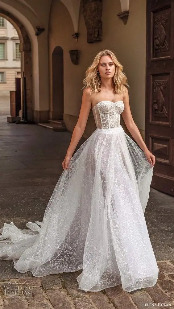 blonde bride wearing corset wedding dress