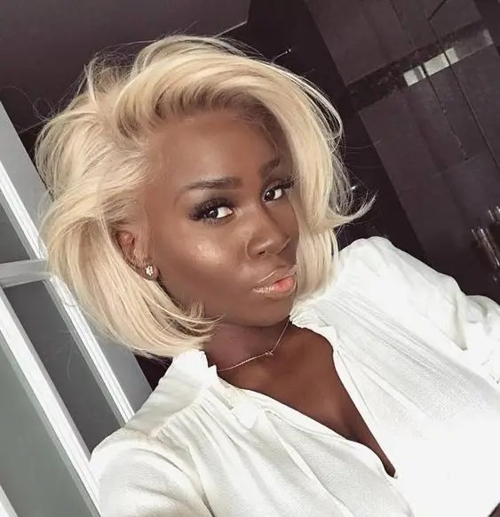 black woman with short blonde hair