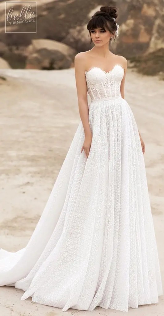 Woman wearing corset wedding dress outdoors