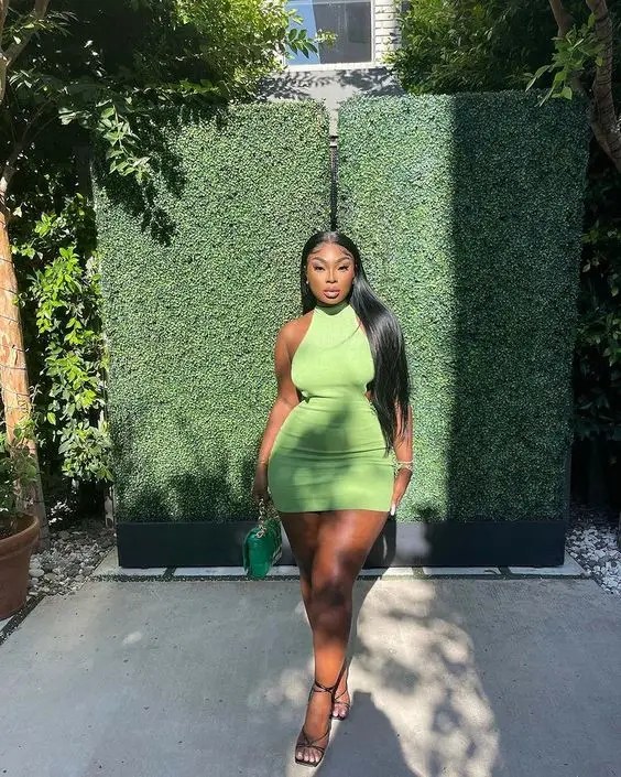 Beautiful woman wearing lemon green dress