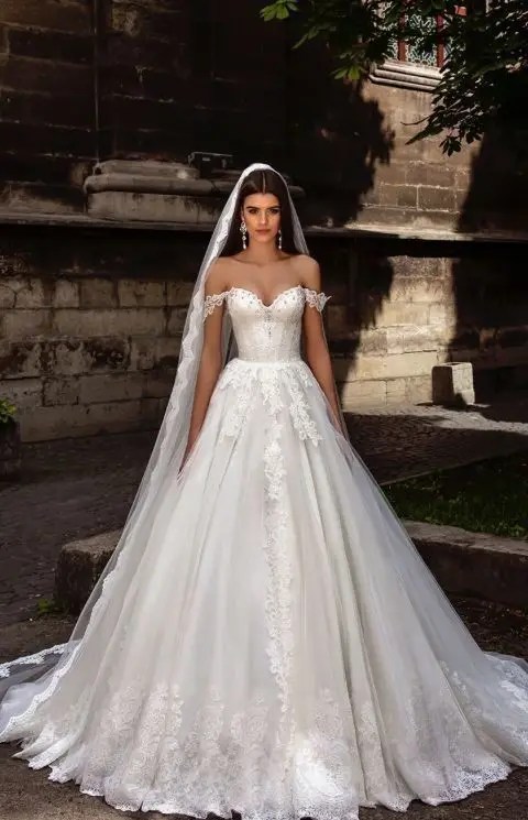 bride in ball gown corset wedding dress