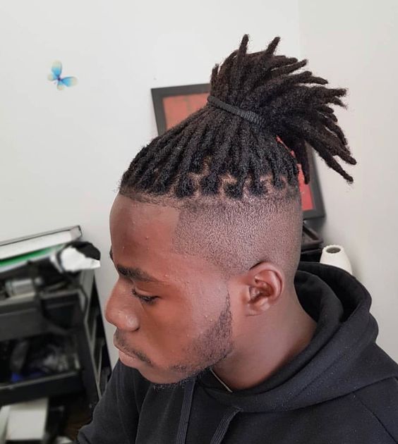 Man stuffed with short dreadlocks style for men