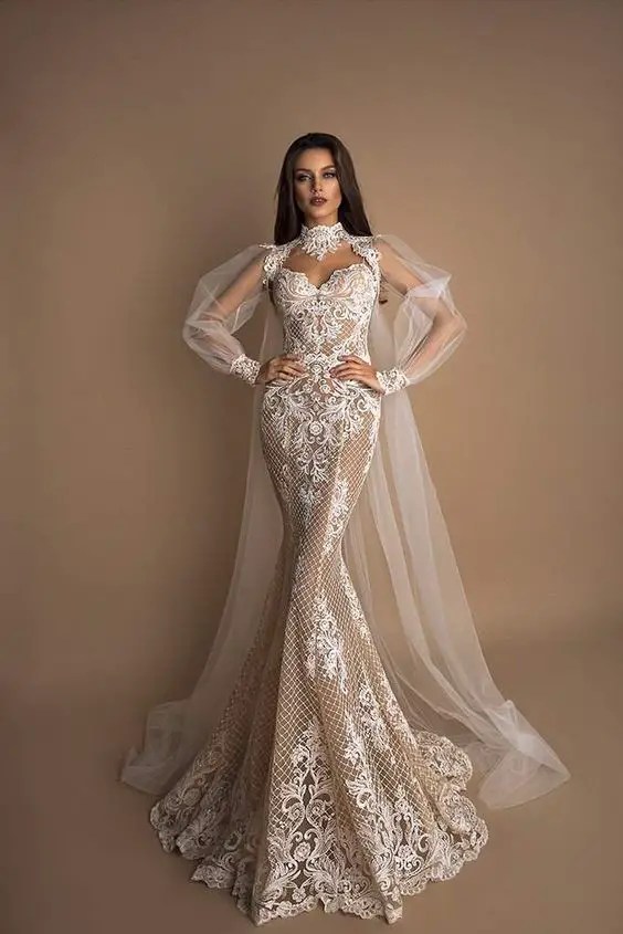 Woman wearing long white lace wedding dress