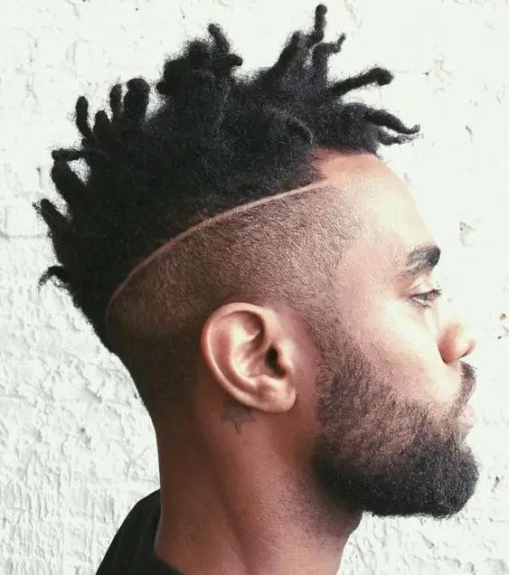 Sideways man showing short dread style for men