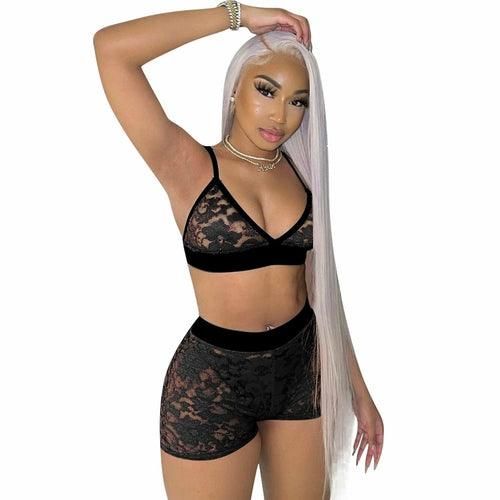 A woman wearing hot pants and matching tops as uncovered clothes