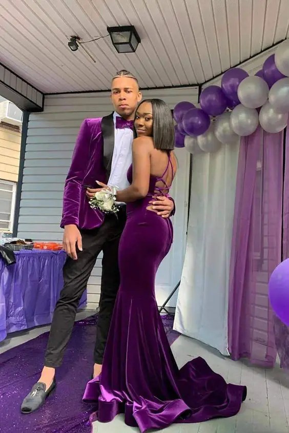 couple wearing purple suit and dinner dress as valentines day outfits for couples