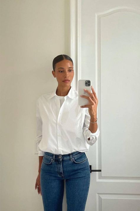 a lady wearing jeans and white shirt as election day outfits
