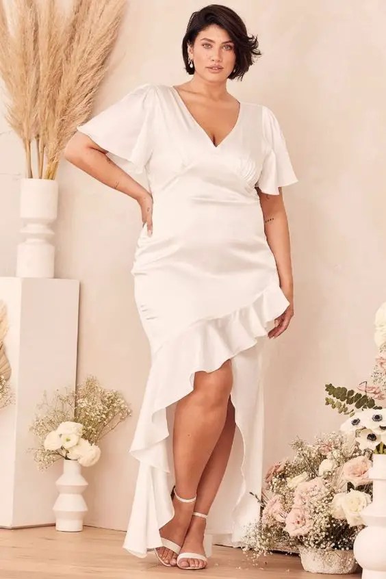 Woman in white high-low silk dress