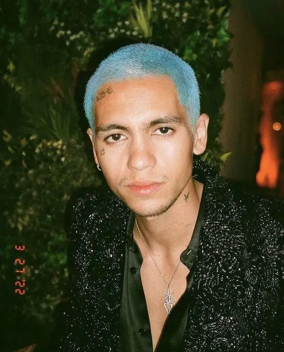 Man with sky blue buzz hairstyle