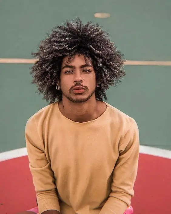 Cute guy with curly silver and brown hair