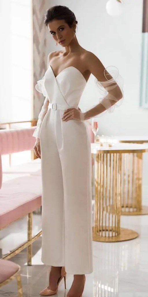 Woman wearing chic jumpsuit as casual ending dress