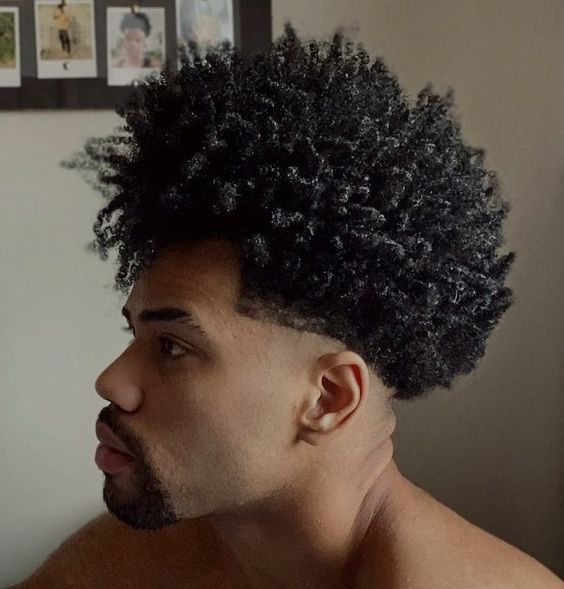 Cute black man with type C curly hair