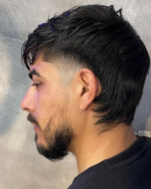 man wearing layered hair with fade