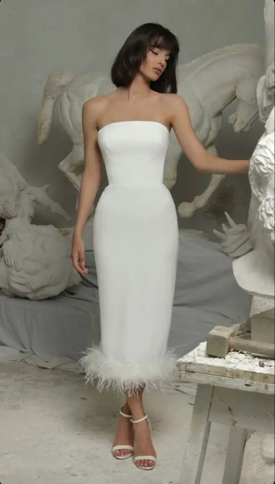 Woman wearing casual sleeveless wedding dress