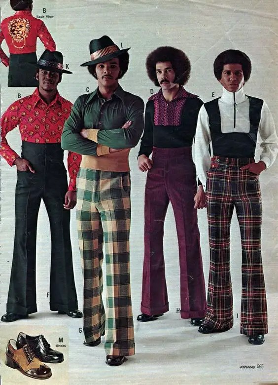Four black men rocking high-waisted pants for 70's style
