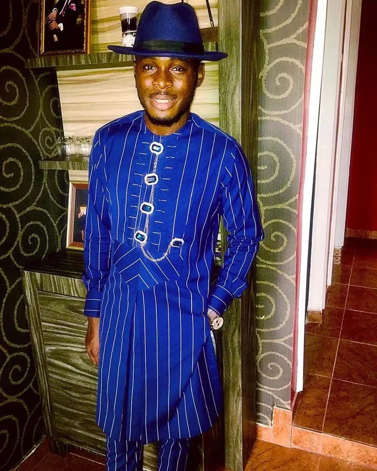 A man wearing a woko suit, a traditional African costume