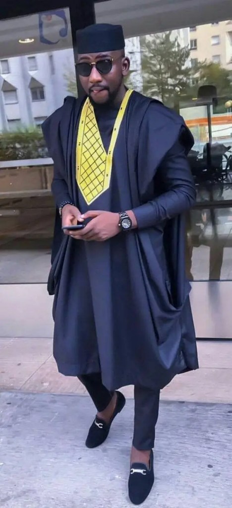 A man wearing Agbada as a traditional African dress
