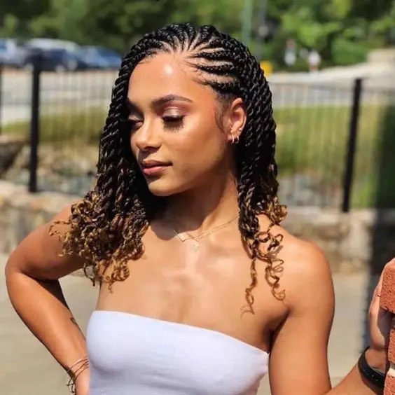 Pretty woman in the sun rocking her tribal braids