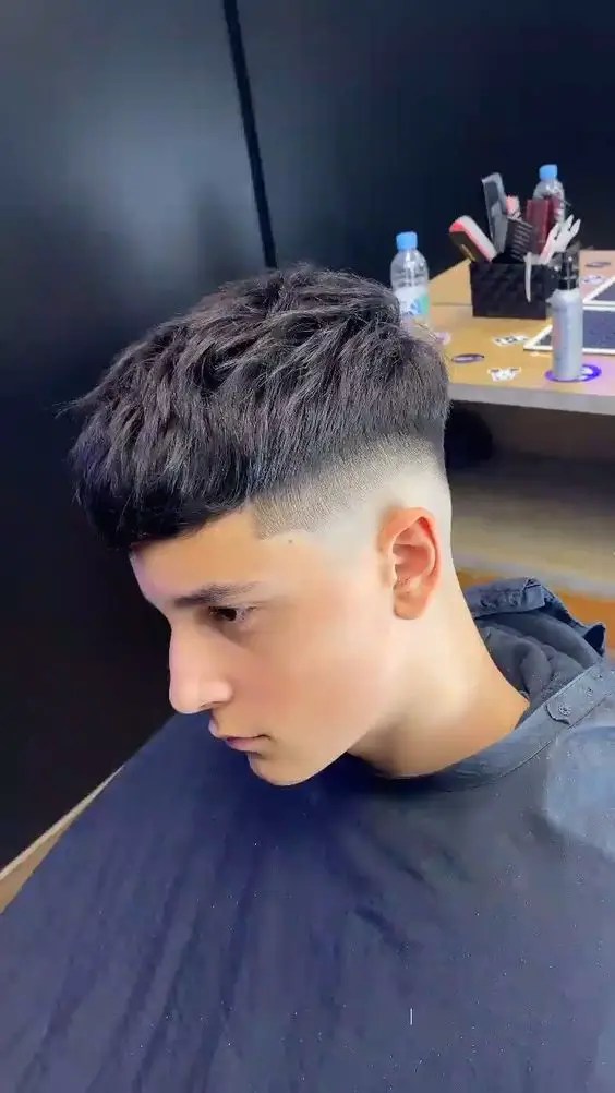 man boasting about his haircut