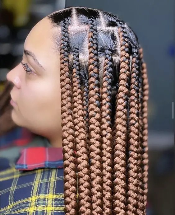Woman showing off box braids