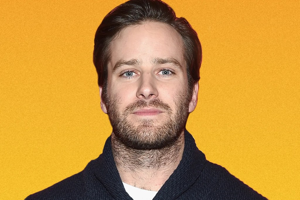 The man shows off a well-trimmed neck beard.