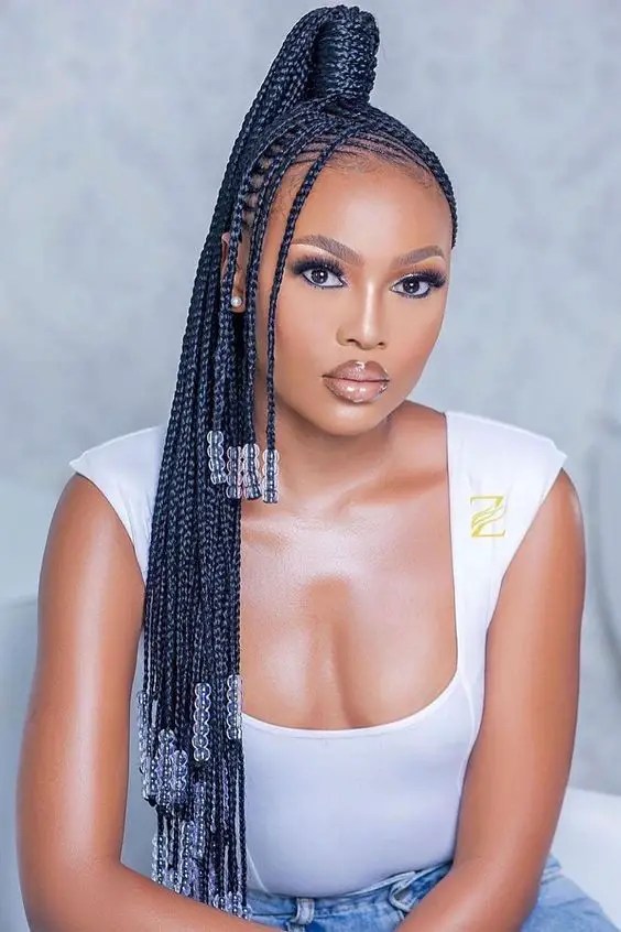 Beautiful woman wearing Ghanaian braid with beads.