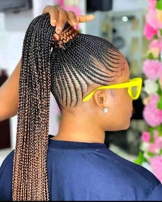 Small Ghana weave style wrapped in a high ponytail