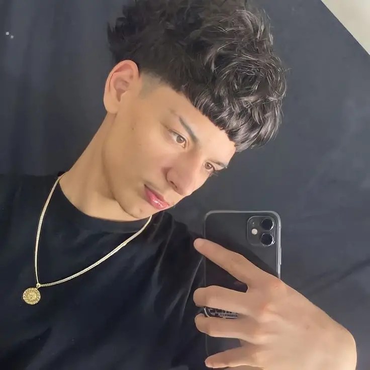 Man rocking a fluffy haircut