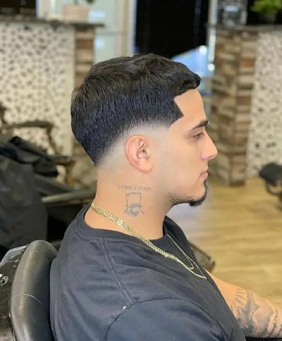 cute man showing his hair sideways