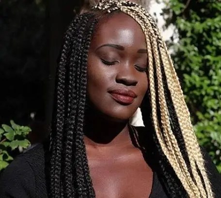 Beautiful black woman rocking blonde and black braids