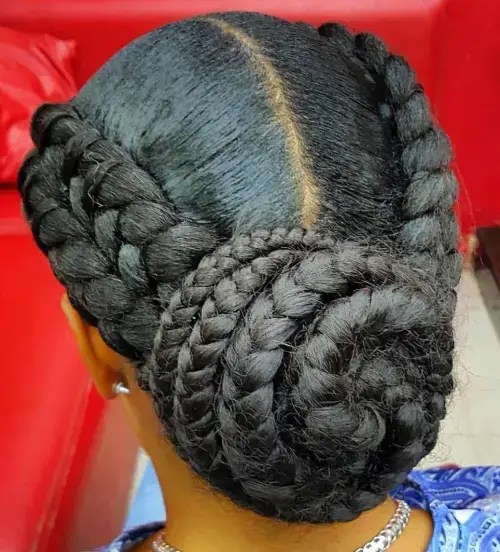 Thick Ghana weave style with middle part wrapped in buns