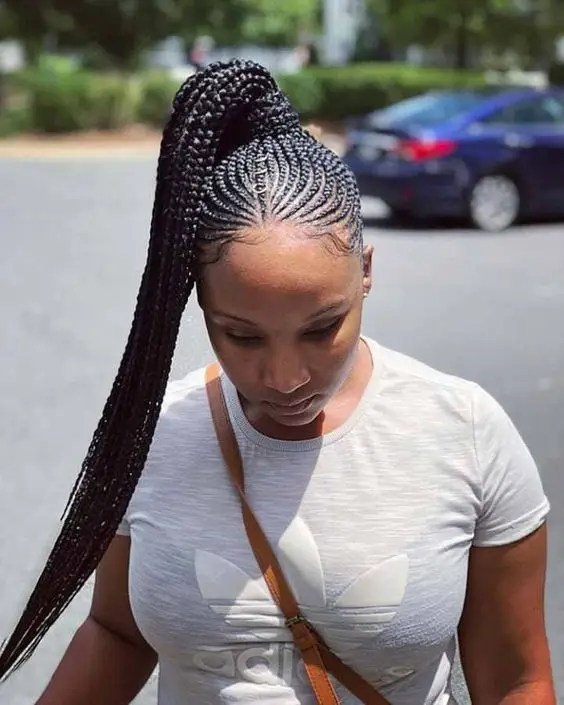 A woman on the street wearing a Ghana weave shuk