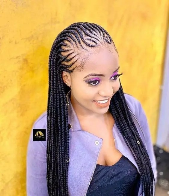 Fair Smile Woman Rocking All Back Ghana Weave Style