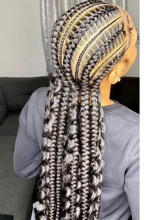 Beautiful woman wearing stitched ghana weave style