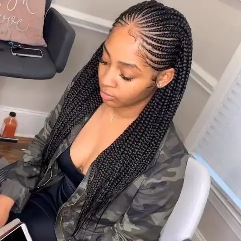 Woman wearing two-step tribal cornrow braid