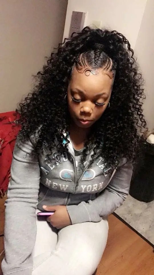 Woman wearing curly weave tribal braids