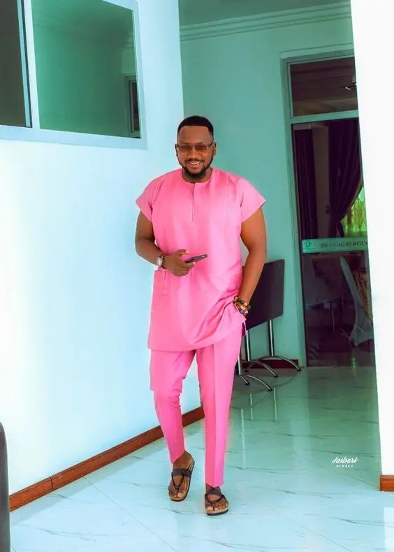 Handsome man wearing pink caftan style for men