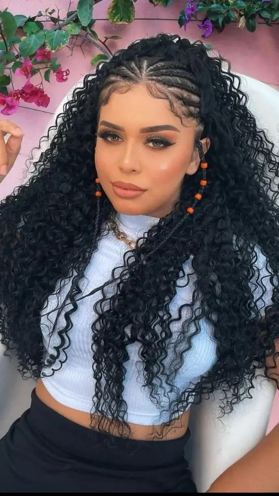 Pretty woman wearing curly faux tribal braids