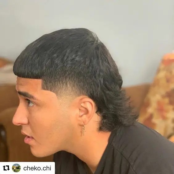 Man rocking Edgar's haircut in a mullet