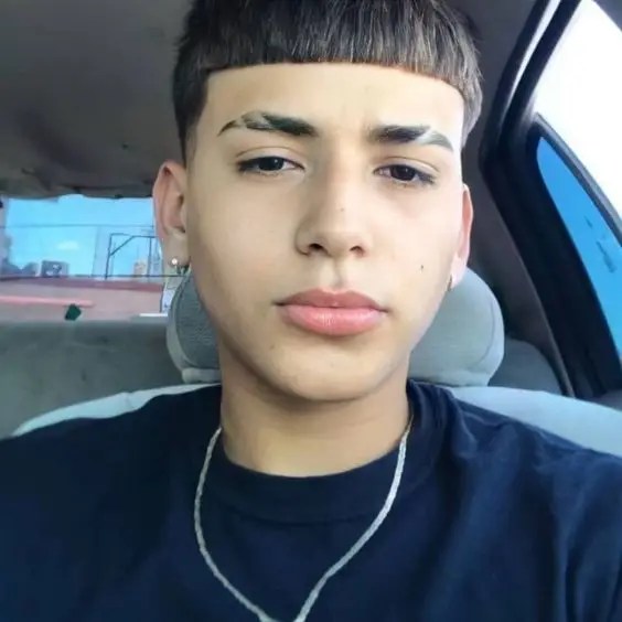 Man rocking a haircut with bangs