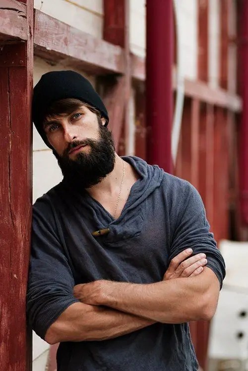 Handsome man rocking a fully bearded look