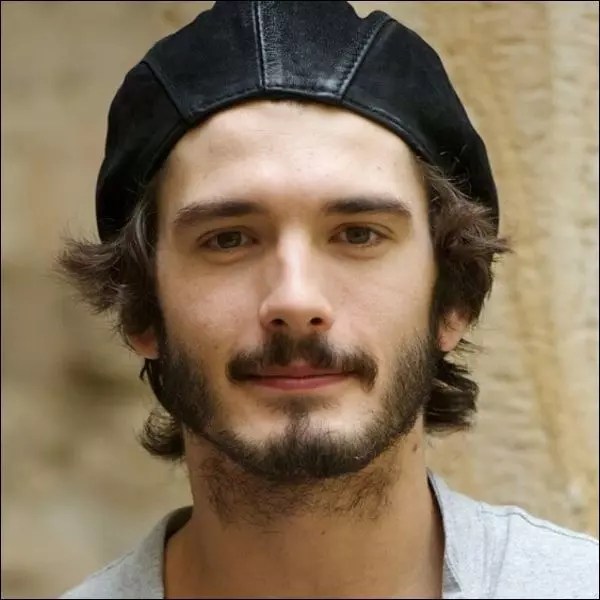 Man shows off his scanty neck bearded look