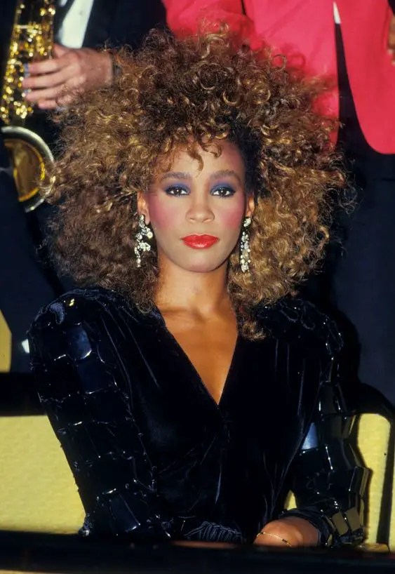 Big balloons with curly hair were one of the go-to looks in the '80s